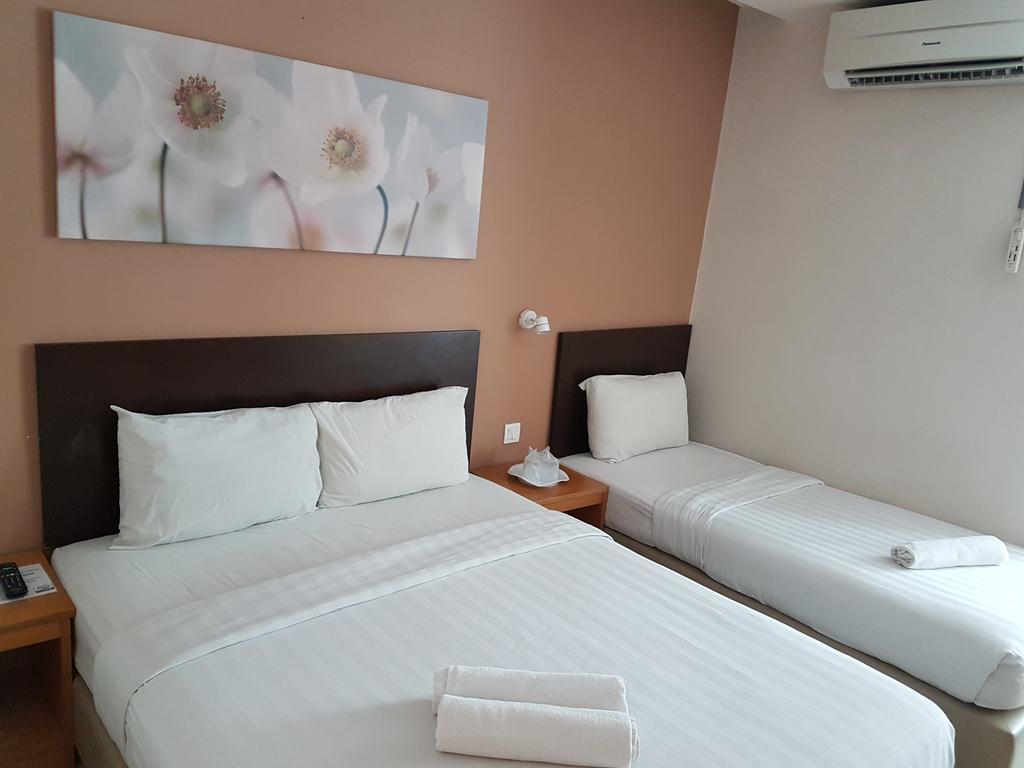 Hotel Asia Куах Номер фото